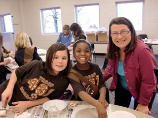 Helen Helwig and Girl Scouts making bowls